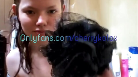 Brunette hair takes washroom rubbing soap all...